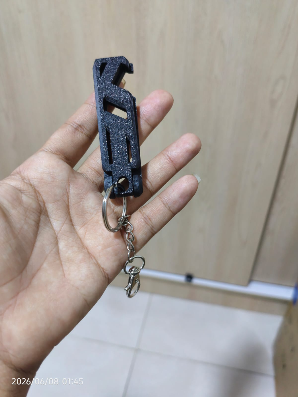 Llavero multiherramienta con destapador